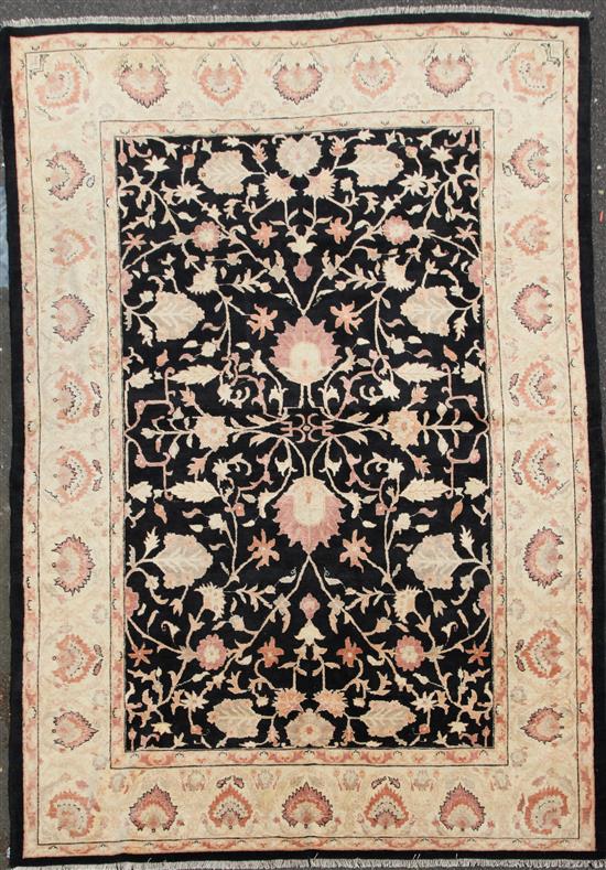 A Caucasian style carpet, 12ft 5in by 8ft 10in.